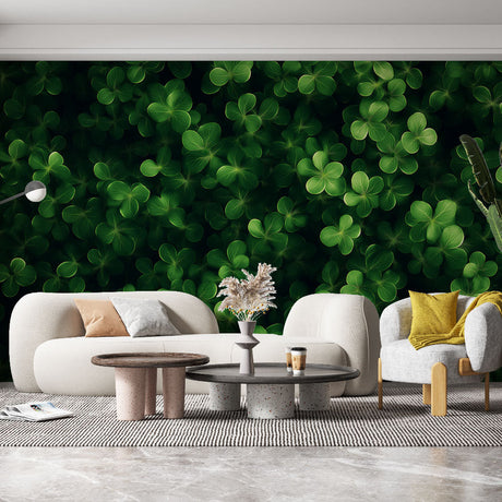 Green clover leaf wallpaper creating a fresh botanical atmosphere in a modern living room with natural light