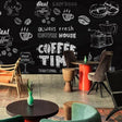 Coffee shop wallpaper mural styled in modern kitchen with black and white chalk design