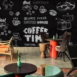 Coffee shop wallpaper mural styled in modern kitchen with black and white chalk design