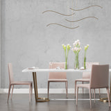 Concrete effect wallpaper bringing industrial charm to dining room wall