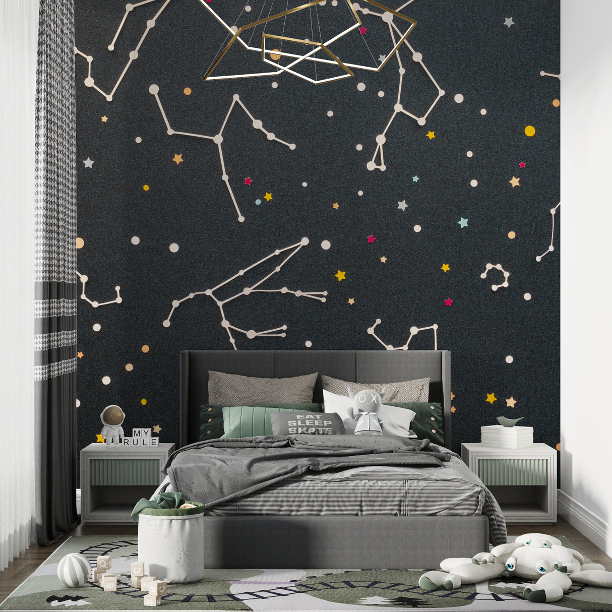 Playroom with celestial wall mural showing colorful star patterns and constellations