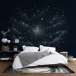 Constellation wallpaper creating a cozy atmosphere in a modern bedroom, with soft lighting highlighting the star patterns