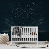 Constellation wallpaper with mountain silhouettes creating a cozy atmosphere in a modern bedroom with soft lighting