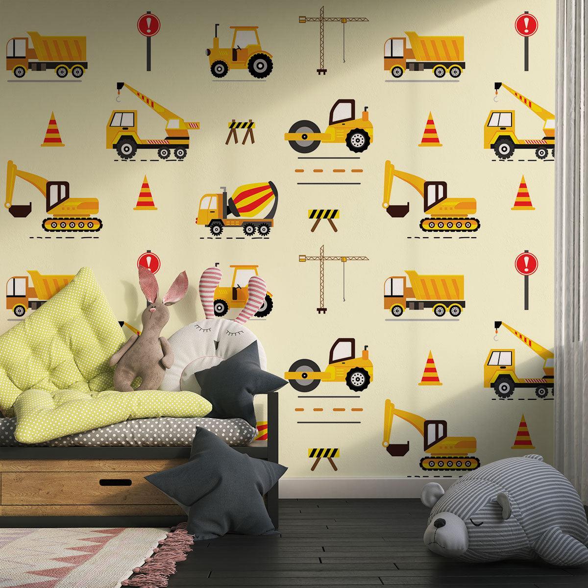Play area decorated with construction site mural featuring safety signs and yellow trucks