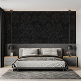 Damask wall mural creating drama in master bedroom with silver accents