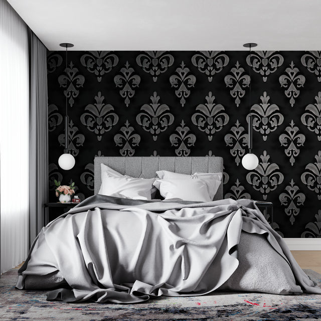 Black and silver damask wallpaper in modern living room with grey sofa and crystal chandelier