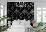 Classic damask wall mural in master bedroom with luxury bedding and silver accents