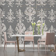 Grey and white Damask wallpaper mural in an elegant dining room with crystal chandelier