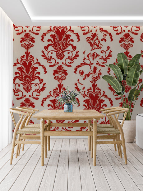 Red damask wallpaper mural in elegant dining room with crystal chandelier and white trim