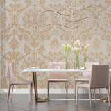 Gold Baroque wallpaper in modern living room with grey sofa and natural light