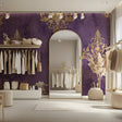 Purple and gold damask wallpaper in elegant dining room with crystal chandelier