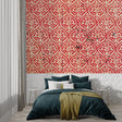 Damask wallpaper mural in elegant dining room with crystal chandelier and red accents