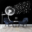 Black and white dandelion wallpaper creating dramatic impact in modern living room with grey sofa and minimal decor