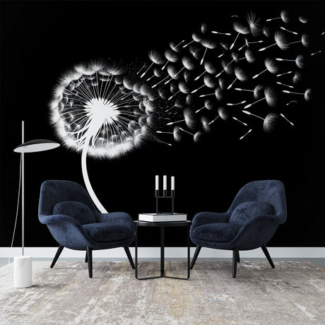Black and white dandelion wallpaper creating dramatic impact in modern living room with grey sofa and minimal decor
