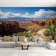 Desert Mountain Mural Wallpaper creating depth in a modern living room, red rock formations adding warmth to the space