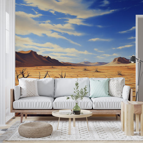 Desert landscape wallpaper creating depth in a modern living room, warm earth tones complement contemporary furniture