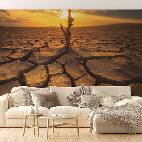 Desert landscape wallpaper creating a warm atmosphere in a modern living room with minimal furniture