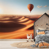 Desert Hot Air Balloon wallpaper creating a stunning focal point in a modern living room with earth-toned furniture