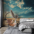 Desert landscape wallpaper shown in a modern minimalist living room, creating a peaceful atmosphere with golden earth tones