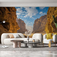 Desert canyon wallpaper creating depth in modern living room, warm earth tones complement contemporary furniture