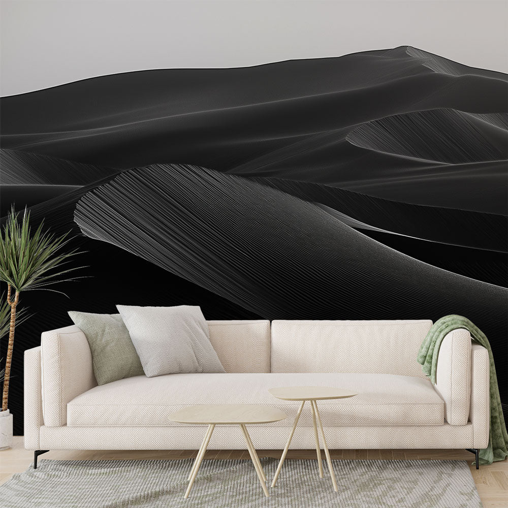 Black and white desert dunes wallpaper creating a dramatic focal point in a modern minimalist living room with clean lines
