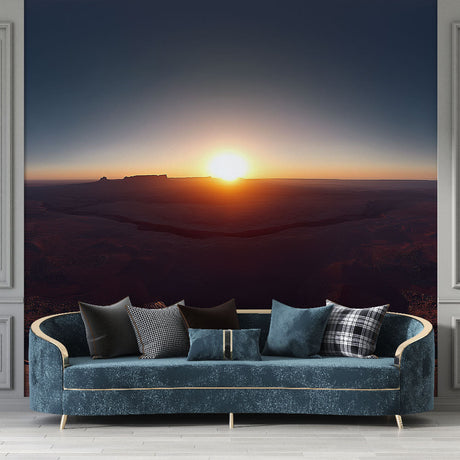 Desert canyon sunrise wallpaper mural in a modern living room, showing warm morning light and panoramic views