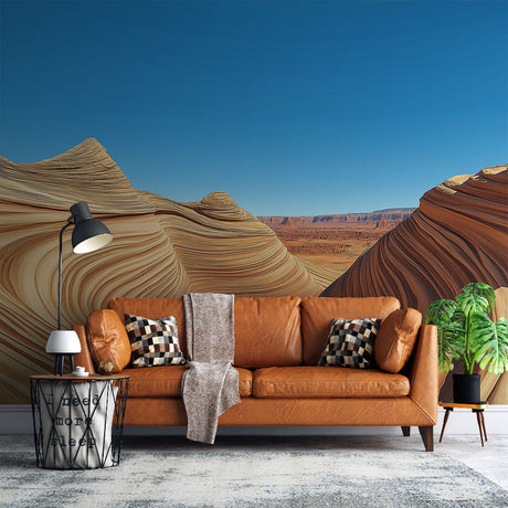 Desert rock formation wallpaper creating a stunning focal point in a modern living room with earth-toned furniture