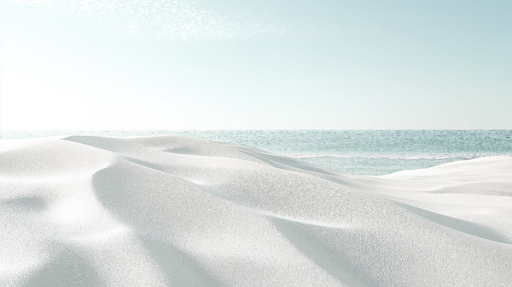 Desert landscape wallpaper creating a calming atmosphere in a modern living room with white sand dunes and ocean view