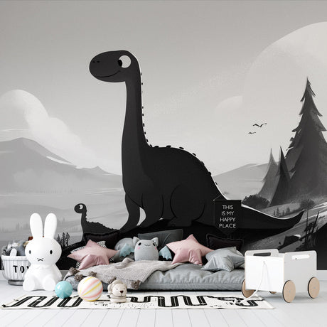 Black and white dinosaur wallpaper creating a calm atmosphere in a modern nursery with simple furniture and natural light