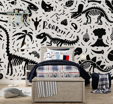 Black and white dinosaur skeleton wallpaper creating an educational atmosphere in a modern playroom