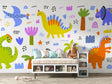 Dinosaur mural wallpaper bringing joy to a modern nursery with white furniture and natural light