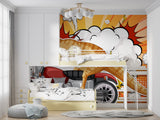 T-Rex biker wallpaper brightening up a basement play area with orange and yellow tones