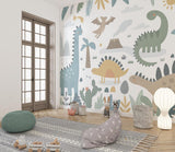 Kids bedroom featuring sweet dinosaur wallpaper with reading nook and play area