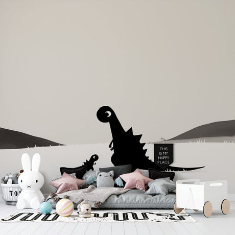 Modern black and white dinosaur wallpaper creating a peaceful atmosphere in a minimalist nursery with natural light