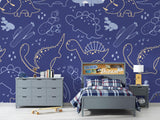 Navy blue dinosaur wallpaper in modern nursery with gold accents