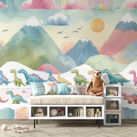 Dinosaur wallpaper mural with pastel mountains shown in a bright, modern kids bedroom with white furniture