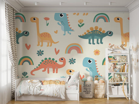 Pastel dinosaur nursery wallpaper in a bright, modern nursery with white furniture and rainbow accents