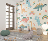 Dinosaur wall mural creating a cozy reading corner in a toddler's bedroom