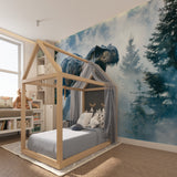 Dinosaur forest wallpaper creating dramatic impact in modern kids bedroom with blue accents