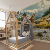 Prehistoric mural wallpaper adding depth to gaming room setup