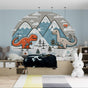 Dinosaur winter mountain wallpaper creating a magical atmosphere in a cozy nursery with soft blue walls and natural wood furniture