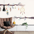 Dreamcatcher wall mural creating a peaceful atmosphere in a modern bedroom with soft natural lighting