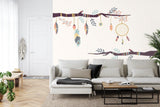 Boho feather wallpaper bringing charm to a cozy reading nook with plush cushions