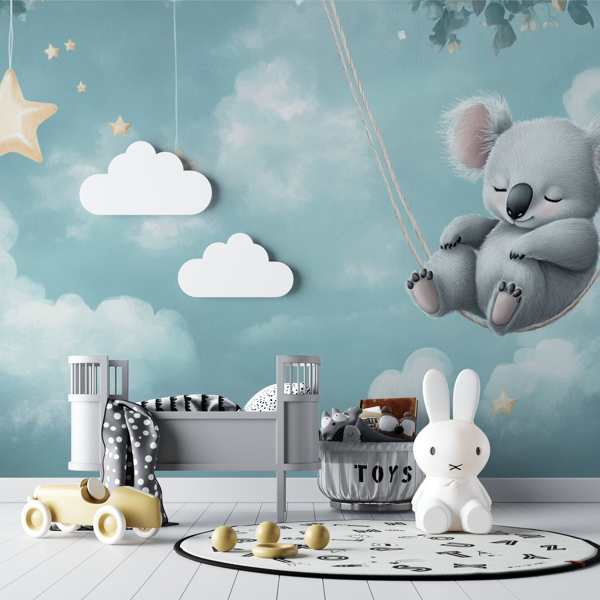 Kids room wallpaper with koala and stars shown in a cozy reading nook
