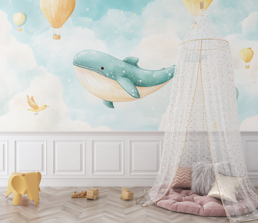 Toddler bedroom showcasing whale and hot air balloon mural in daylight