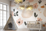 Duck and flower pattern wallpaper in a peaceful baby room with crib