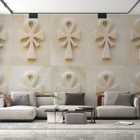 Egyptian 3D Ankh stone effect wallpaper creating depth in a modern living room with minimal furniture