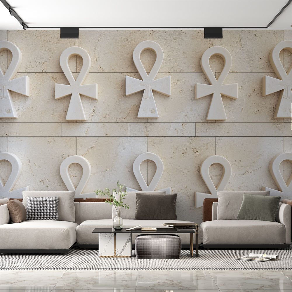 Egyptian wall mural with 3D Ankh pattern creating depth in a modern living room with neutral furniture