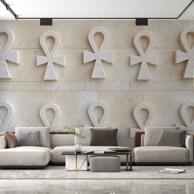 Egyptian wall mural with 3D Ankh pattern creating depth in a modern living room with neutral furniture