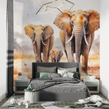 Watercolor elephant family mural installed in nursery with natural lighting